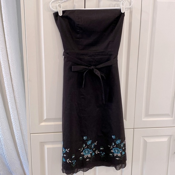 RW&CO strapless dress. Beautiful embroidery on the bottom. Slip underneath. - Picture 1 of 4